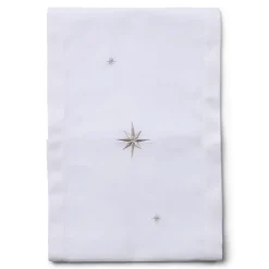 White table runner with embroidered silver stars