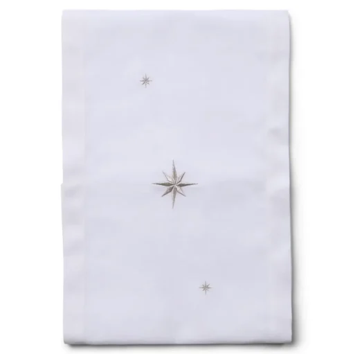 White table runner with embroidered silver stars
